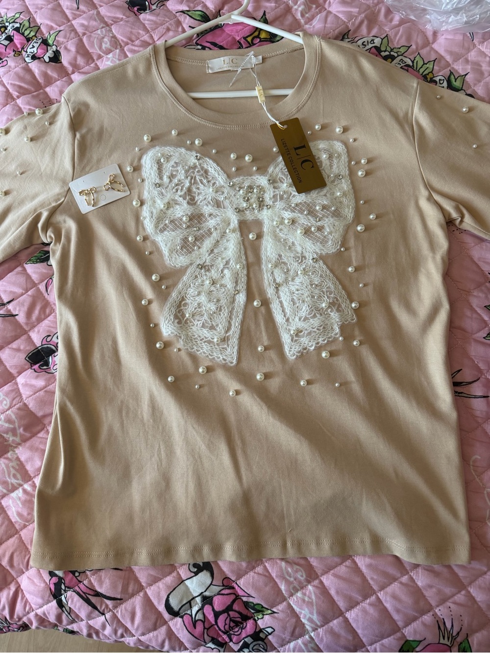 L.C. Cream Bow Pearl Embellished Top